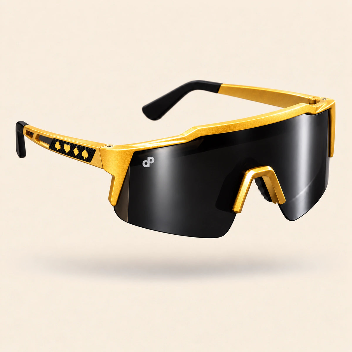 Full opposite three-quarter view of High Roller sunglasses with gold suit symbols on the exterior temple and white DP lens logo, floating on cream.