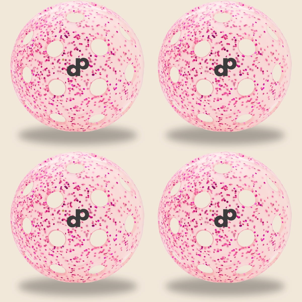 Four-pack pink glitter-infused DOPE pickleballs — exact product photograph