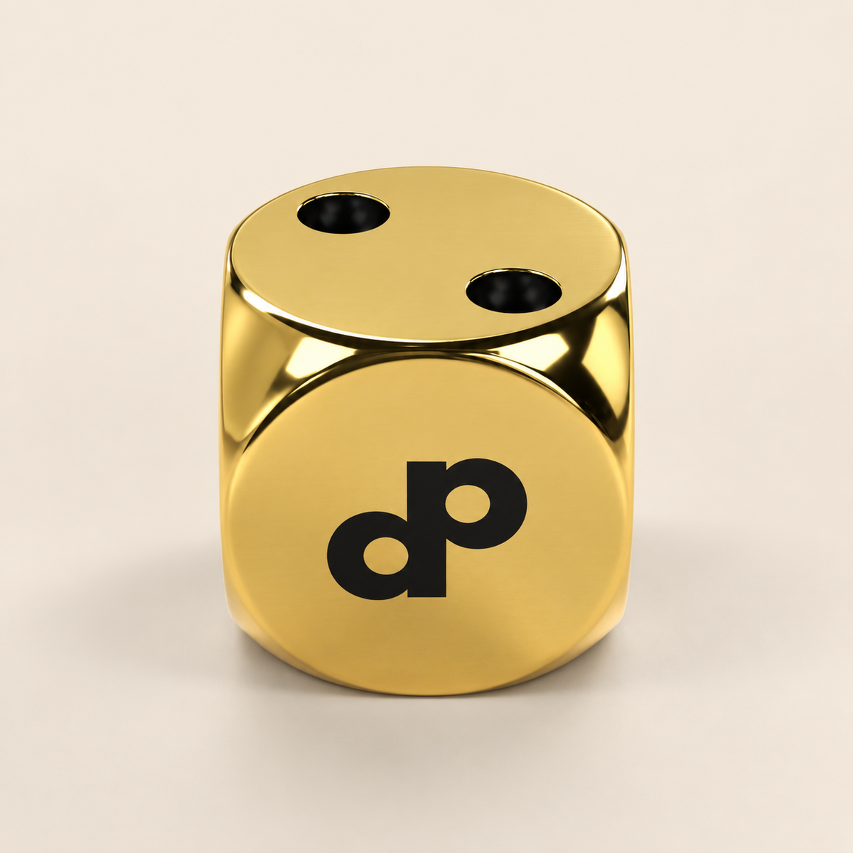 High Roller gold metal die with circular flat faces, a black DP mark, and black recessed pips.