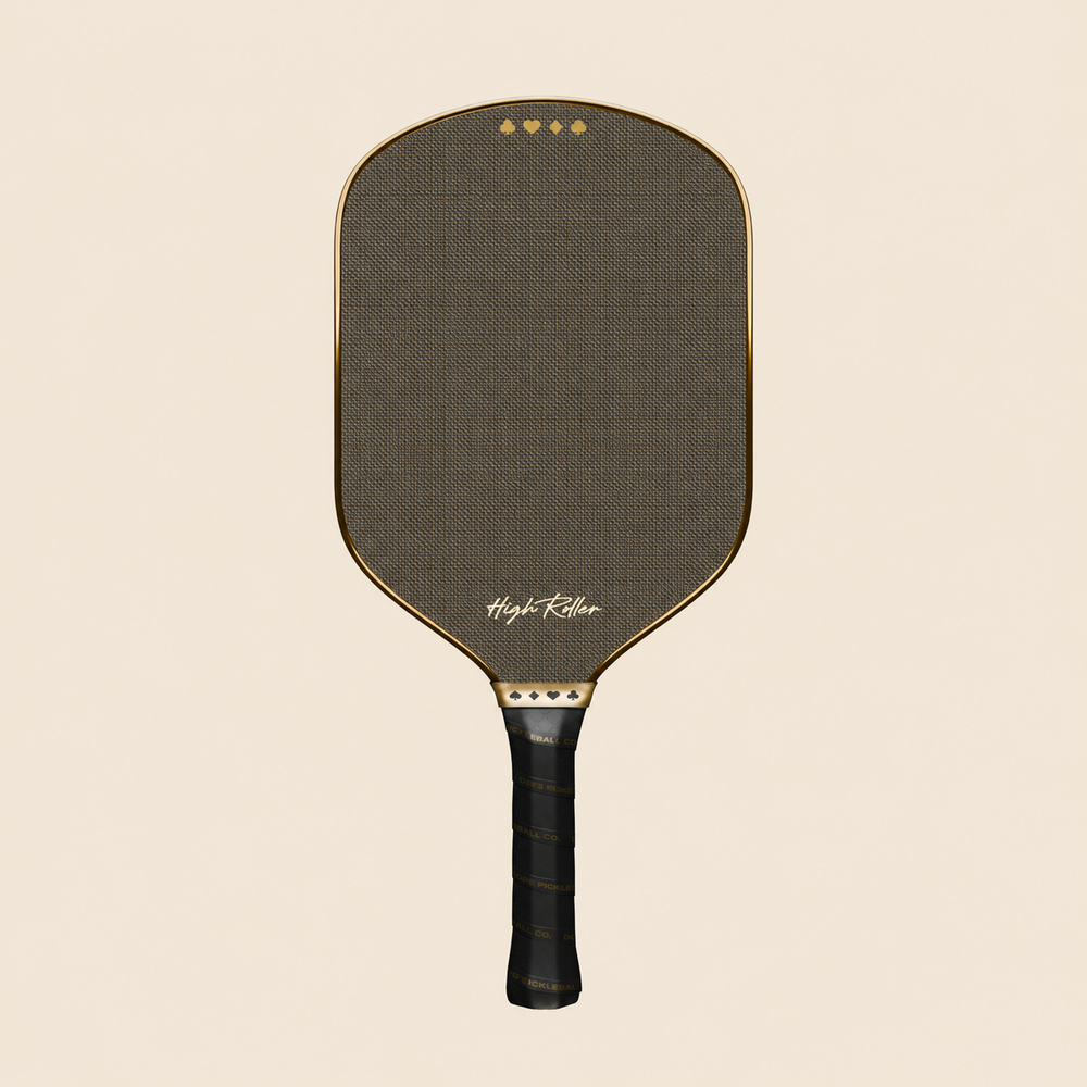 High Roller metallic chrome gold pickleball paddle, straight-on studio view