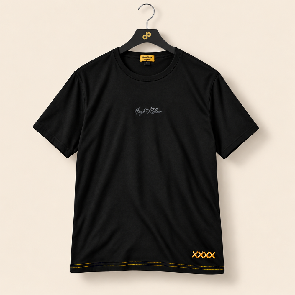High Roller black shirt on a charcoal DP-logo hanger with a silver hook, sewn gold neck label and cream studio background.
