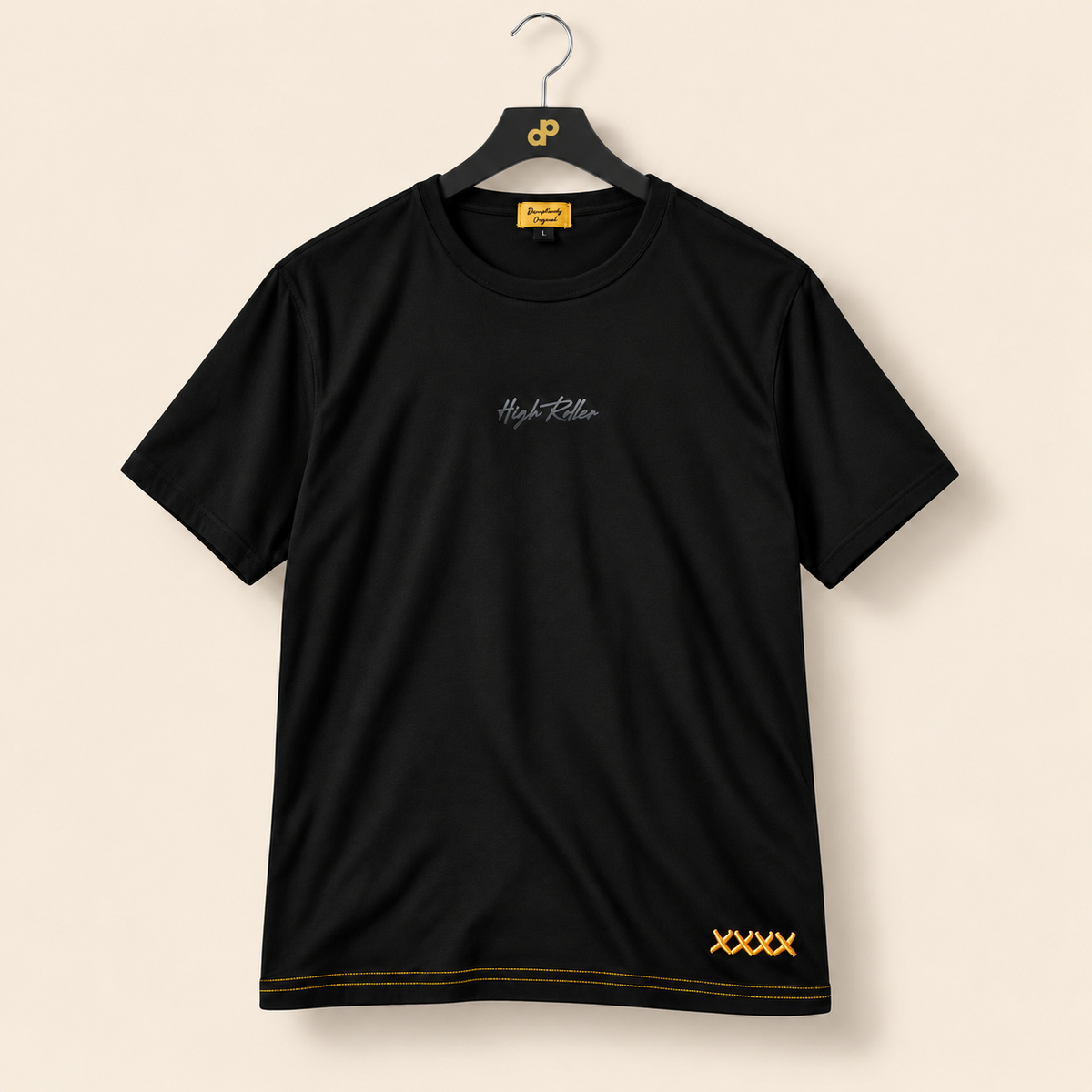 High Roller black shirt on a charcoal DP-logo hanger with a silver hook, sewn gold neck label and cream studio background.