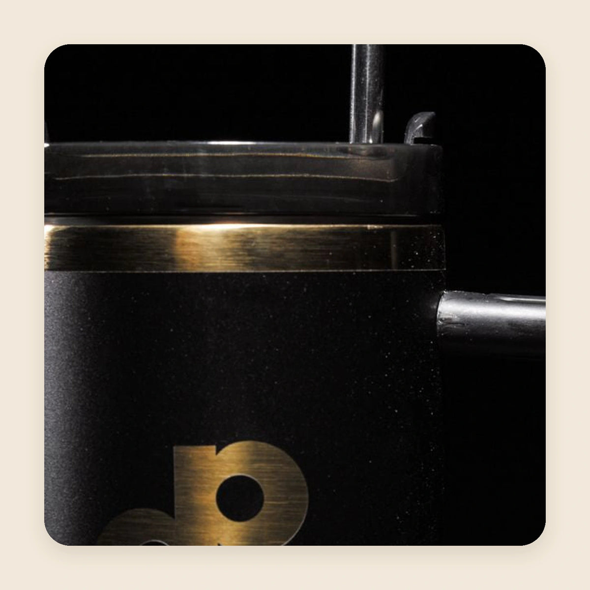 Upper section of the black High Roller tumbler, showing its lid, straw, and handle.