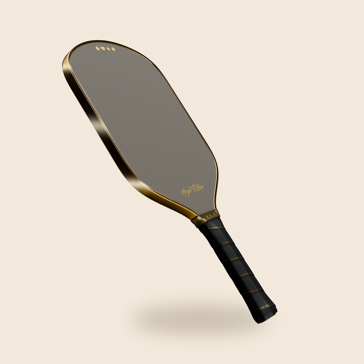 High Roller paddle on warm cream, with bright studio reflections along its gold edge and the original patterned face, suit-symbol collar and printed grip.
