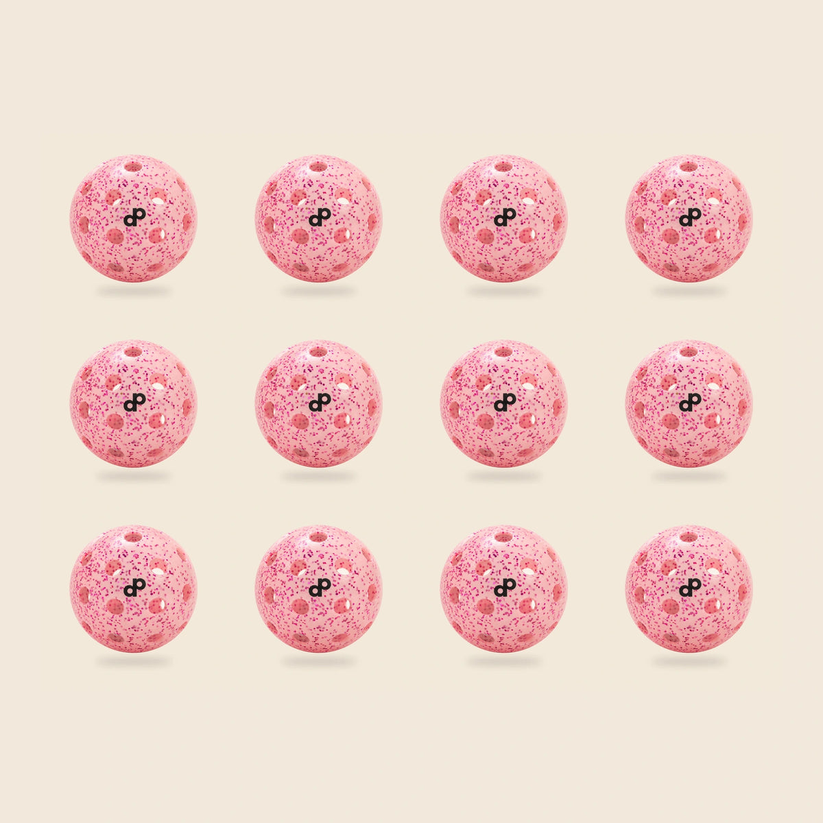 12 pink DOPE glitter pickleballs on cream; exact selected pack quantity.