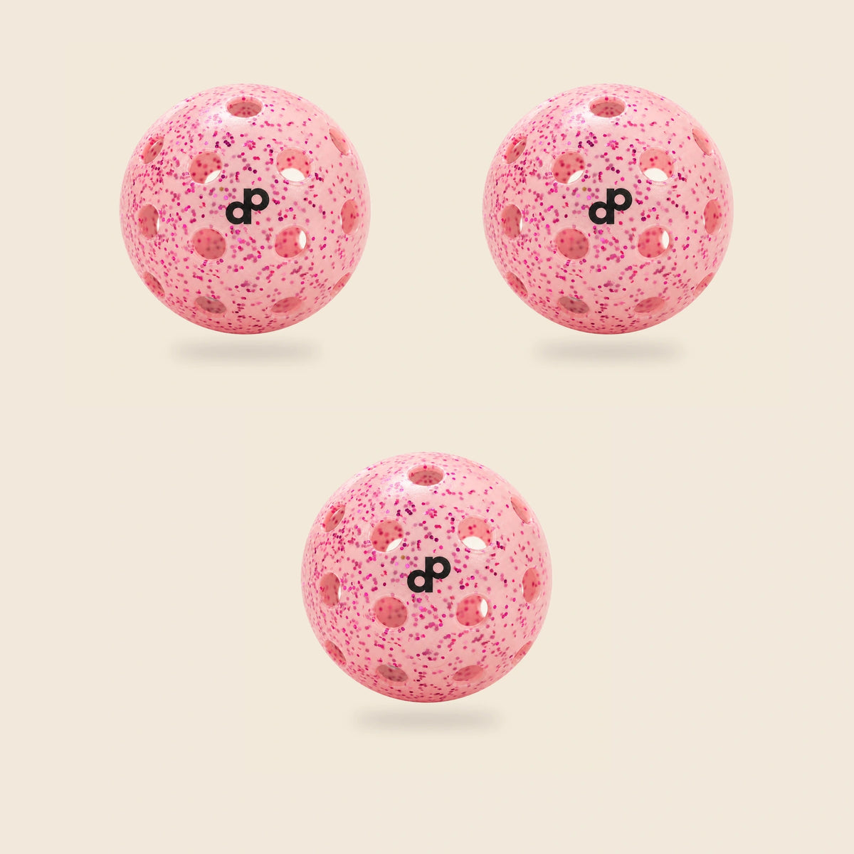 3 pink DOPE glitter pickleballs on cream; exact selected pack quantity.