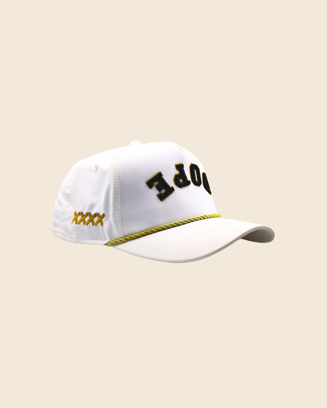 White Dope x Reversed hat at a three-quarter angle with gold side stitching