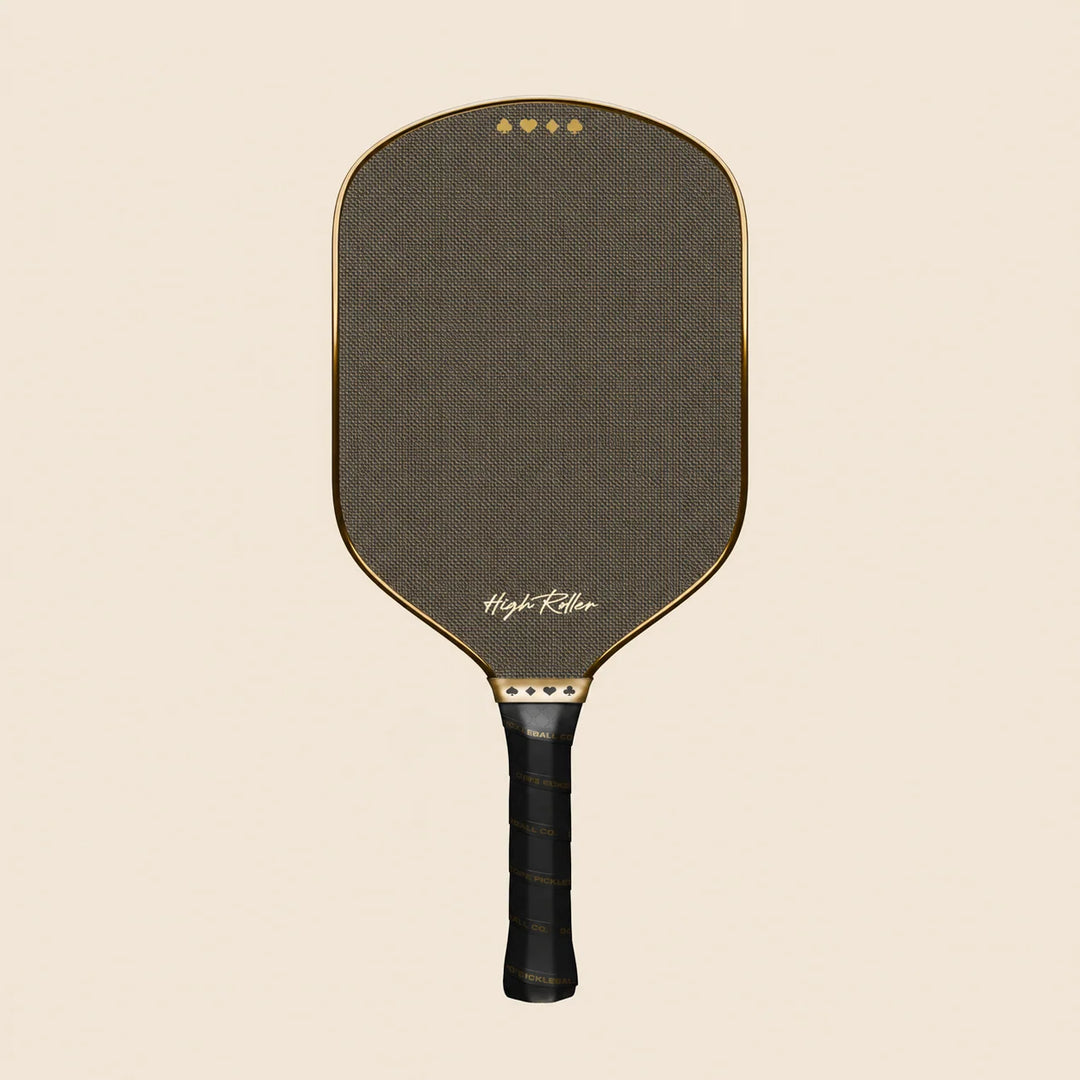 High Roller metallic gold pickleball paddle, straight-on studio view