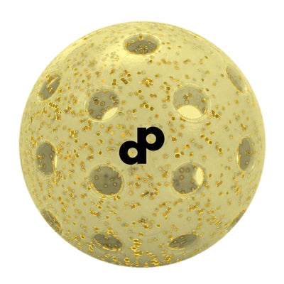 Yellow glitter-infused outdoor pickleball on a clean studio background