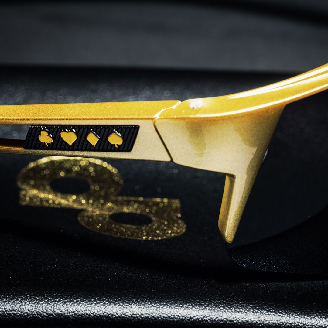 A closeup showing the right Temple side of the High Roller Sunglasses showcasing the 4 playing card suits.